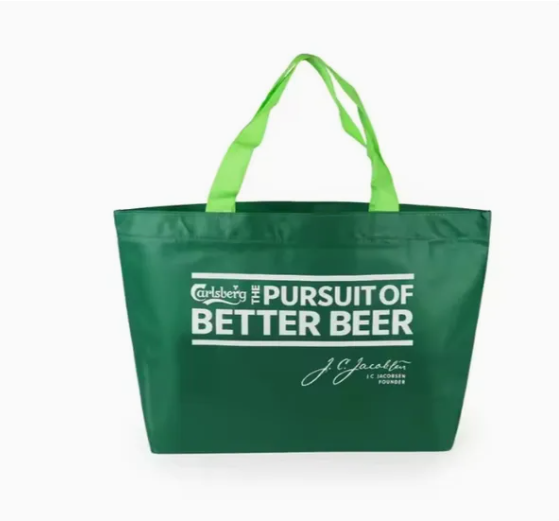 Sleek black non-woven tote bag, minimalist design, high contrast lighting