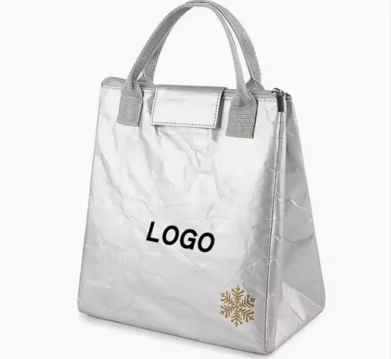 Gray Tyvek envelope-style bag, foldable, compact design, neutral tones